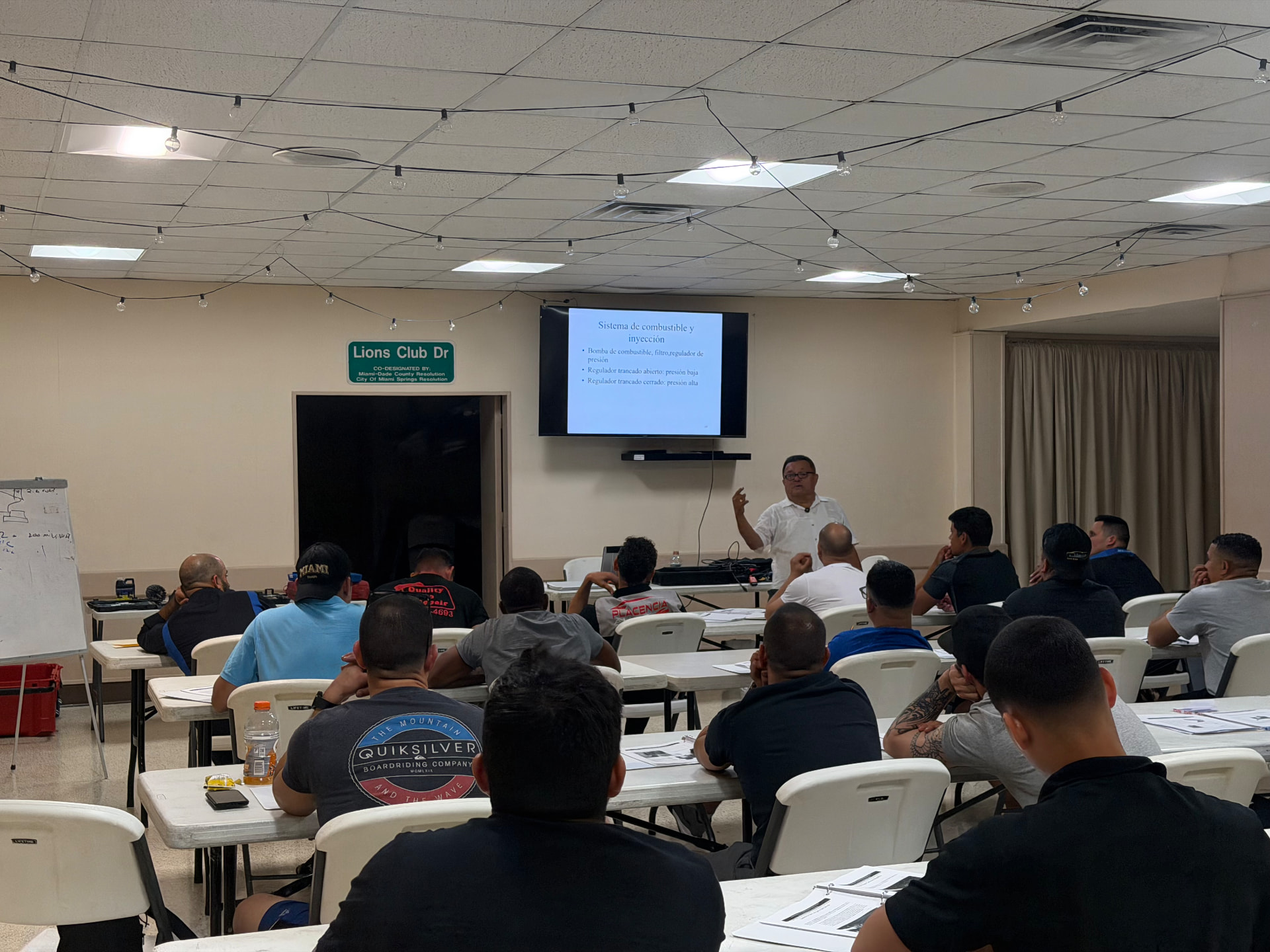 Full classroom of technicians during a fuel and injection systems lecture